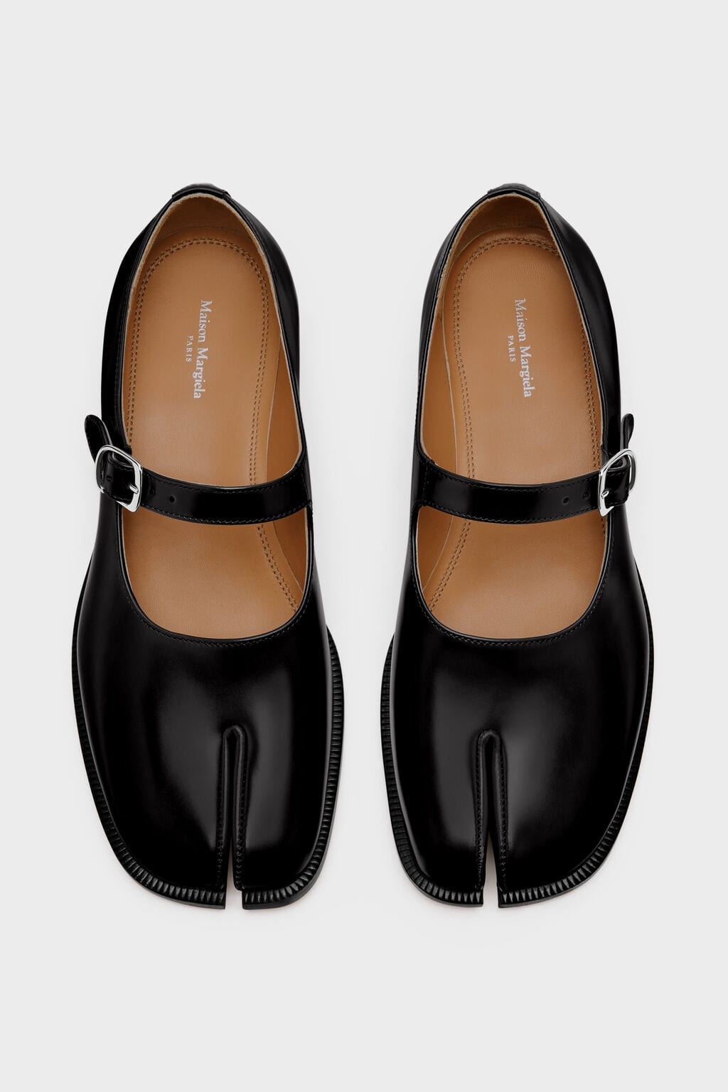 Tabi Mary-Janes - Black, €1,305 (approx. P90,240.75), MAISON MARGIELA, maisonmargiela.com
